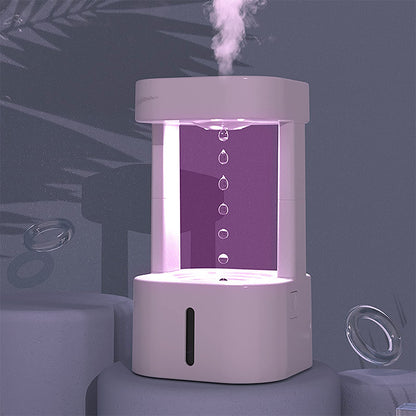 Anti-Gravity Water Drop Humidifier with mist spray and 580ml tank, designed for quiet operation in bedroom or office settings.