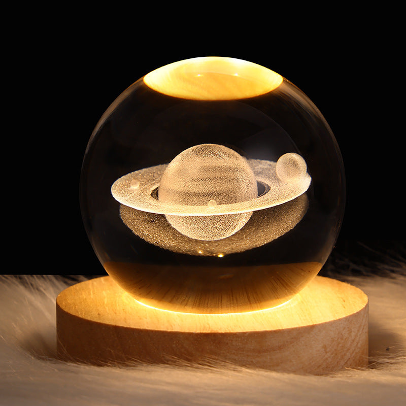 3D Galaxy Crystal Ball LED Night Light featuring Saturn design on wooden base, perfect for magical bedroom decor and gifts.