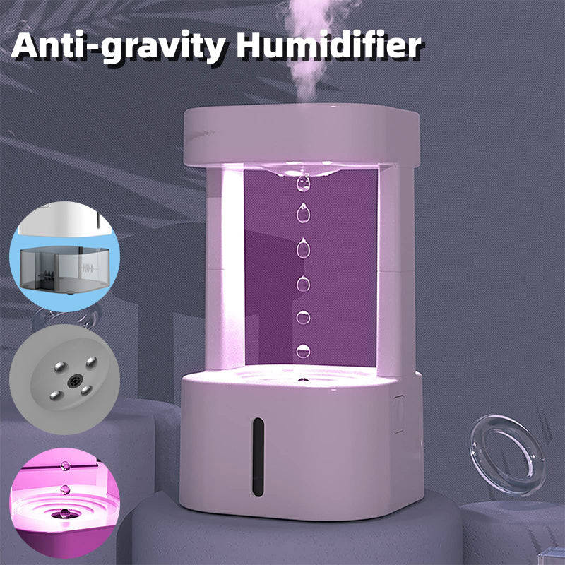 Creative anti-gravity water drop humidifier with mist spray and 580ml tank, ideal for quiet air conditioning in bedrooms and offices.