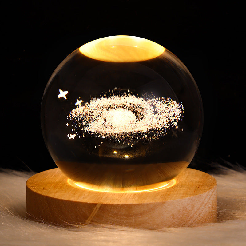 3D Galaxy Crystal Ball LED Night Light with Wooden Base, featuring a mesmerizing spiral galaxy design, perfect for home decor.