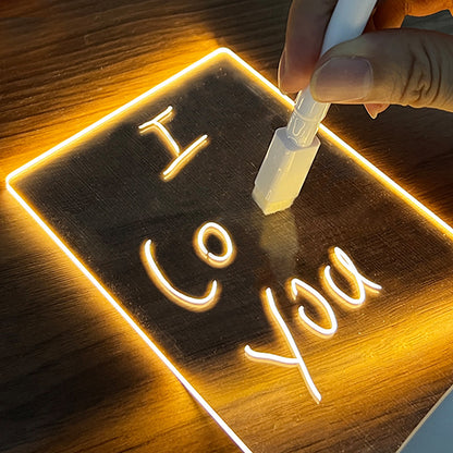 Creative LED message board lamp with personalized writing, glowing in warm light, perfect for notes and decoration.