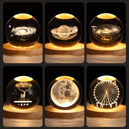 LED Galaxy Crystal Ball Table Lamp with 3D designs of Moon, Saturn, Solar System, Deer Forest, and Ferris Wheel for home decor.